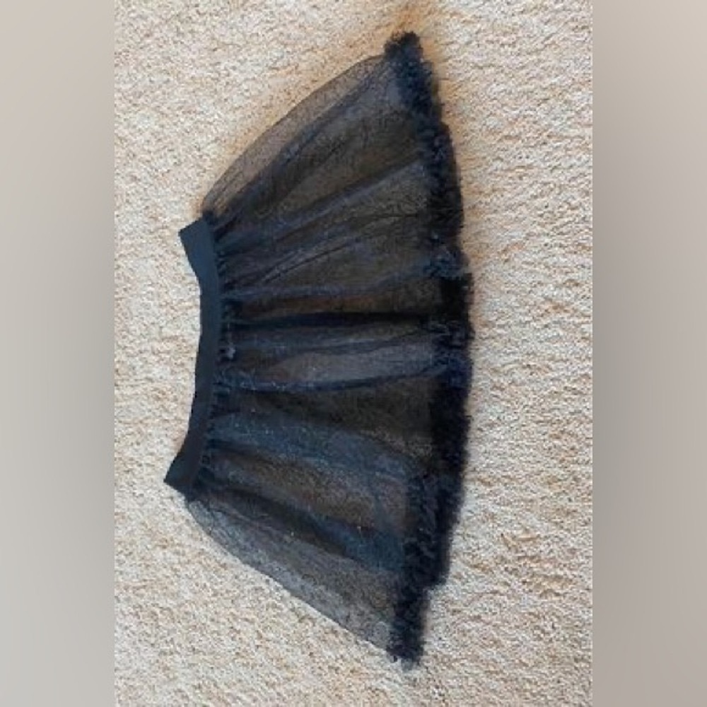 Girls black Capezio skirt size s/m.